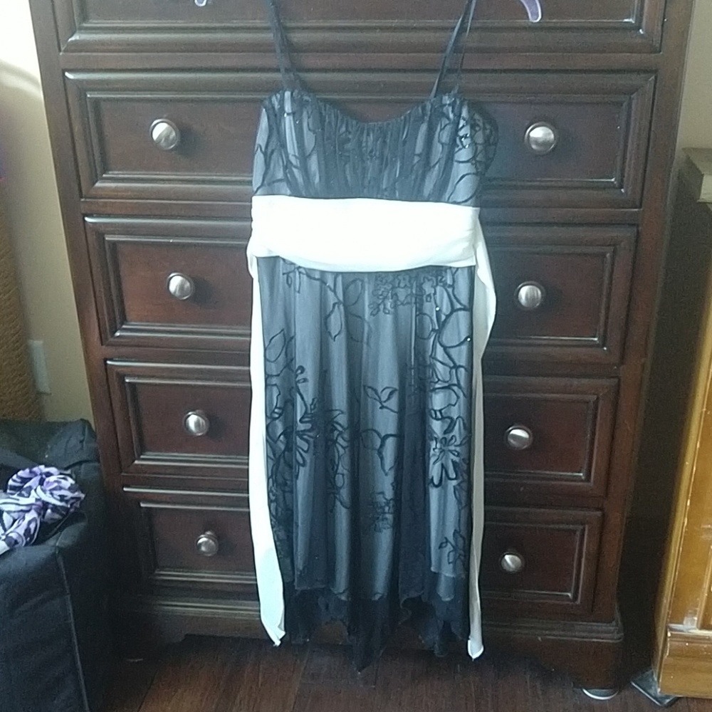 Black & ivory knee length dress. Size Medium